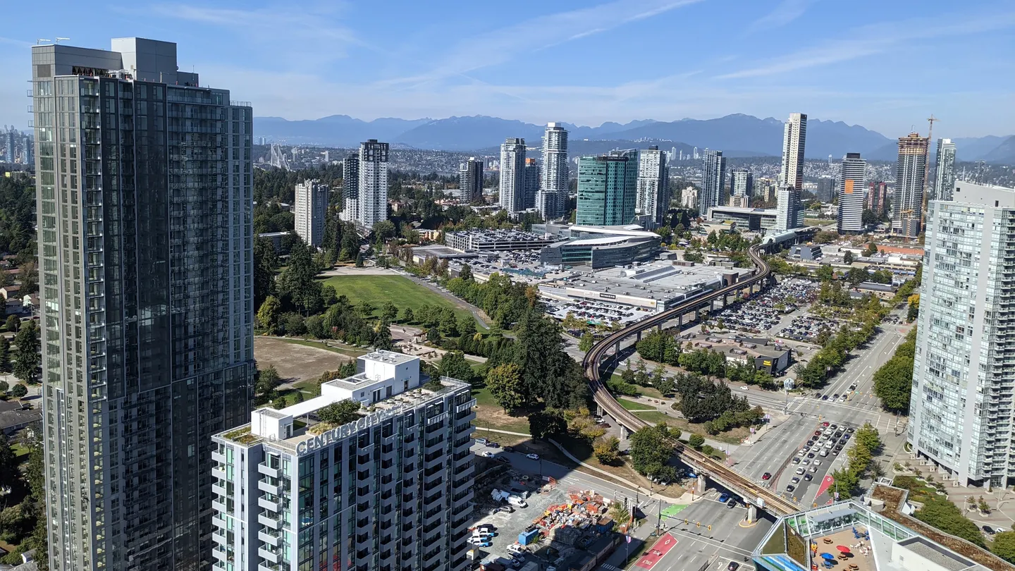 Holland Park, the elevated SkyTrain line and Surrey Central skyline, photographed in September 2025.
